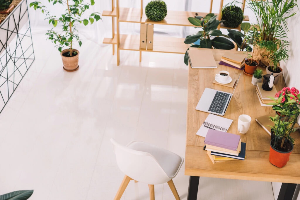 picture of office and laptop on a desk for the article best freelance sites